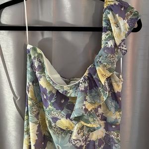Lush one shoulder ruffle floral dress lined up to where ruffled on bottom start